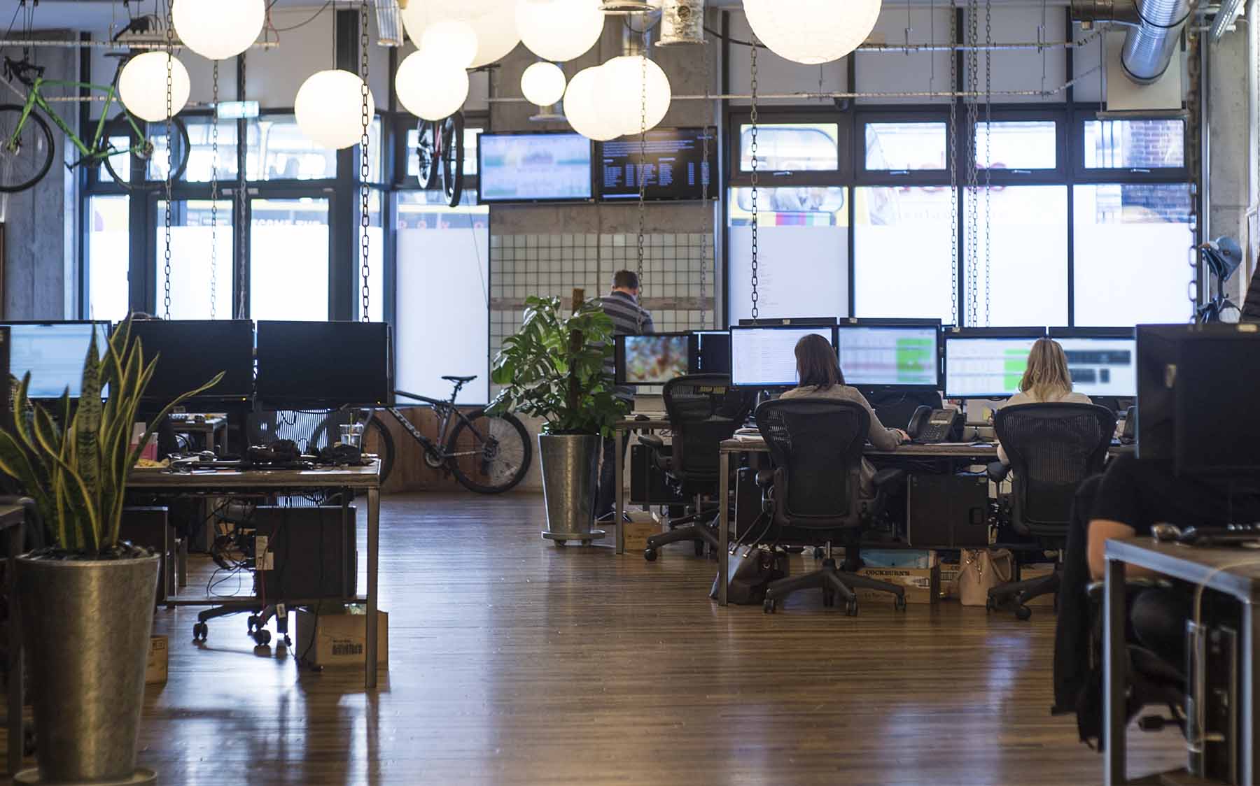 The office with agents on their computers