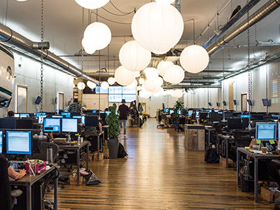 The center of the office with desks on both sides